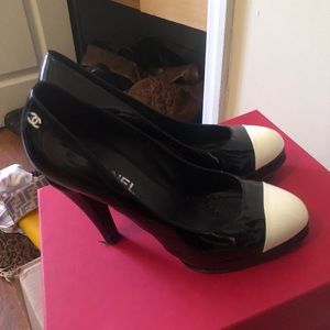 Black and white patten leather Chanel shoes